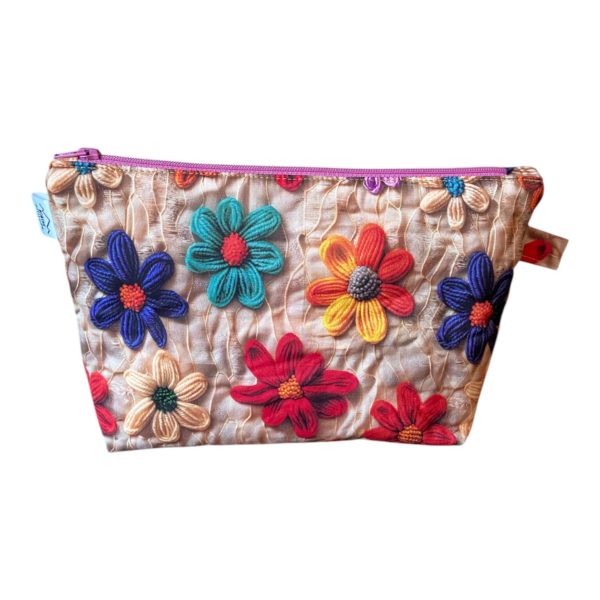 Trousse haute fleurs effet tricot 3D